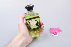 Shunga afrodiziakálny hrejivý zbozkávateľný olej – Midnight Sorbet (100 ml), v ruke